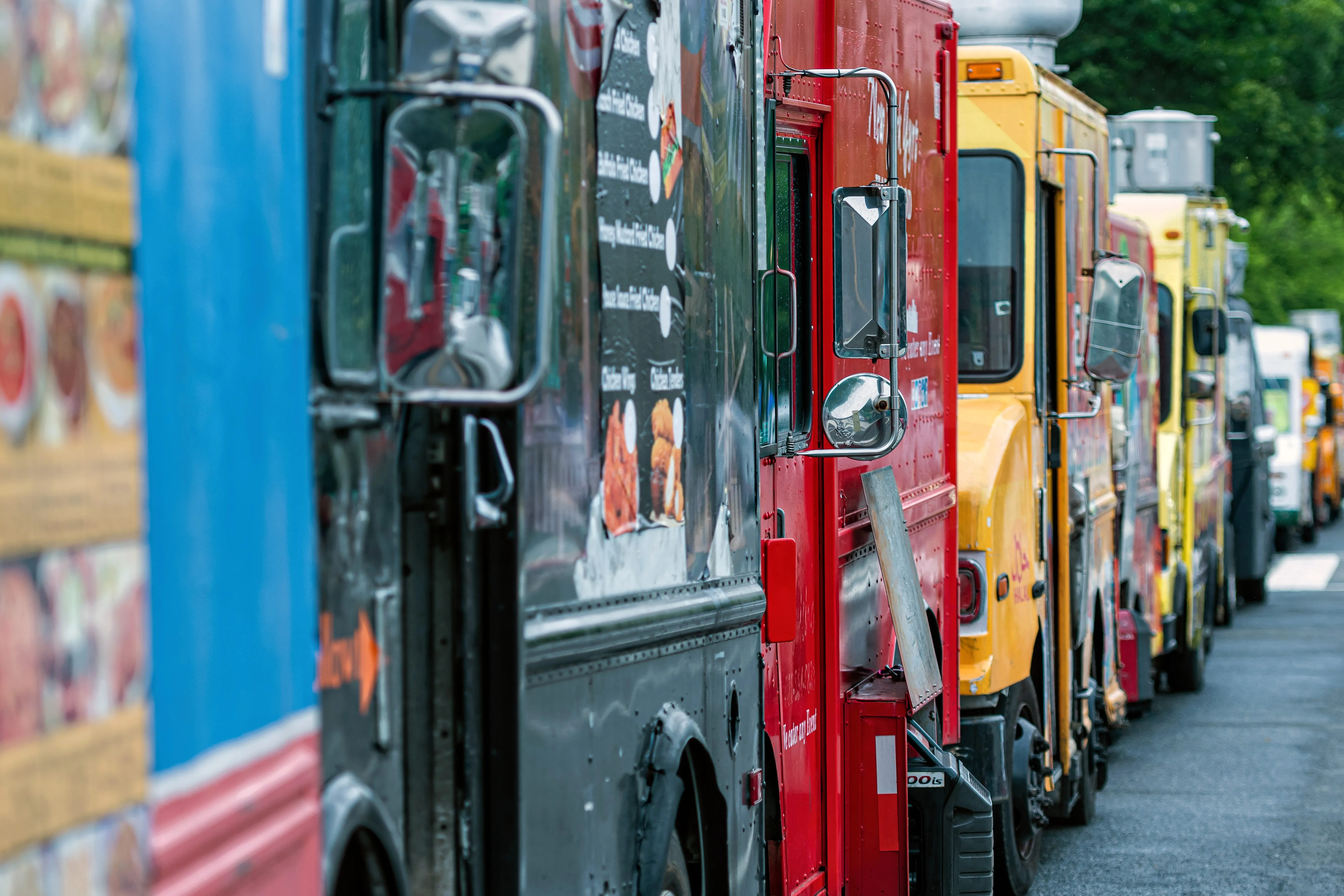 Brightly colored food trucks lined up